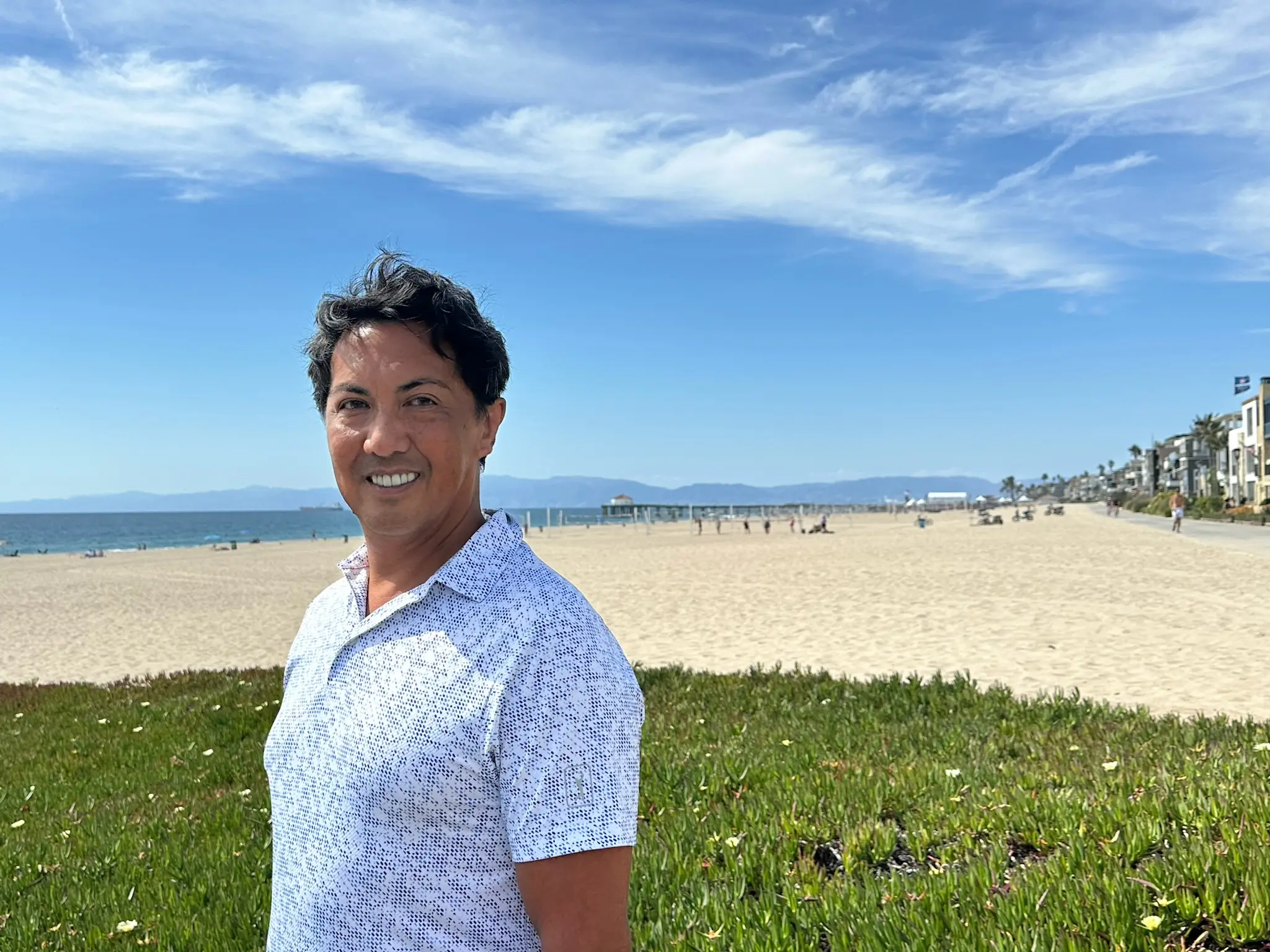 Joseph Ungoco on the beach in Manhattan Beach